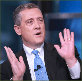 Jim Bullard with hands raised